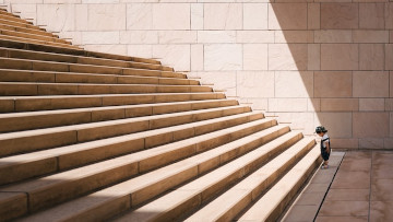 Image of a kid at the beginning of a stair